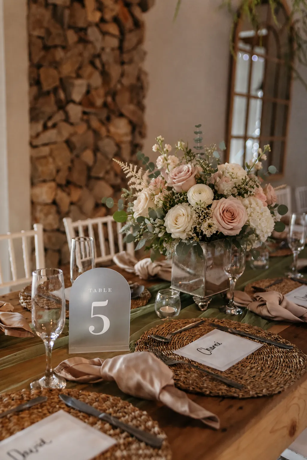 Illustrative wedding flowers in blush, ivory and sage